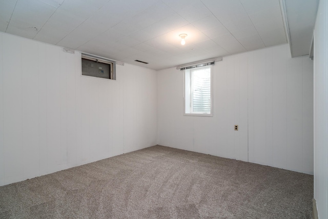 unfurnished room featuring carpet flooring