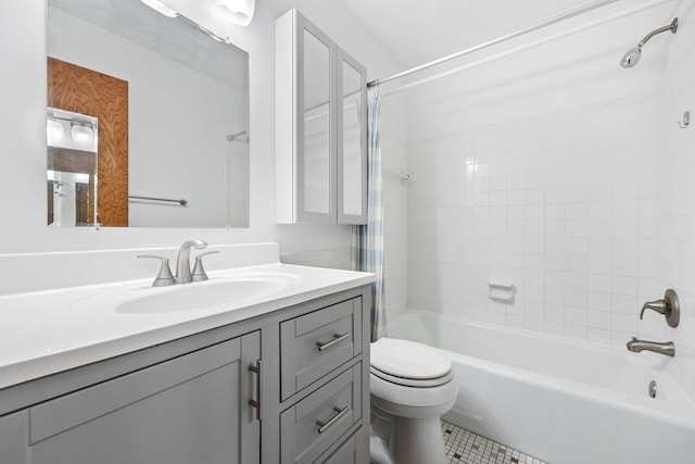 full bathroom with tile patterned floors, vanity, toilet, and tiled shower / bath