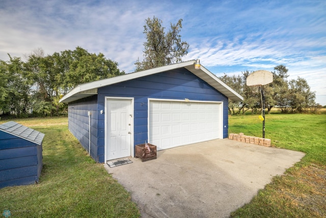 garage with a lawn