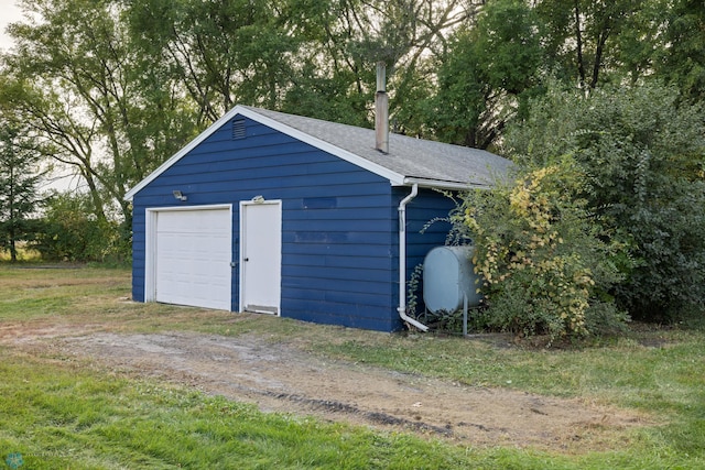 view of outdoor structure featuring a garage