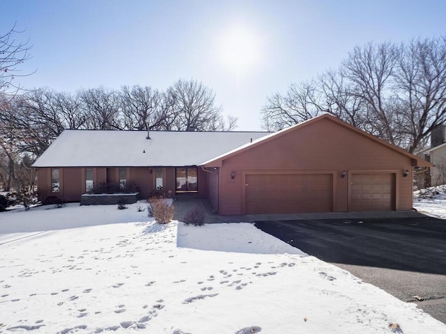 single story home with a garage