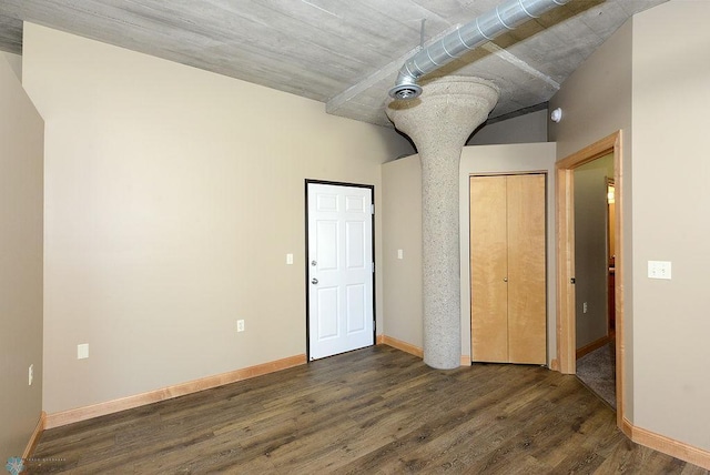 interior space with dark hardwood / wood-style floors