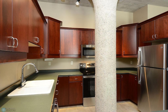 kitchen with sink and stainless steel appliances