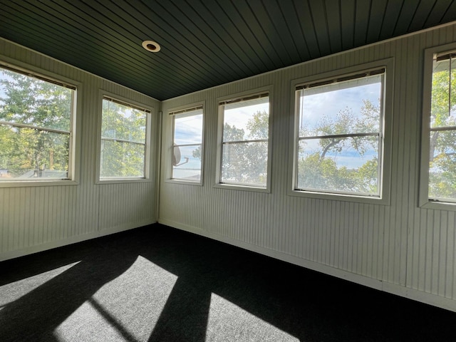 unfurnished sunroom featuring plenty of natural light