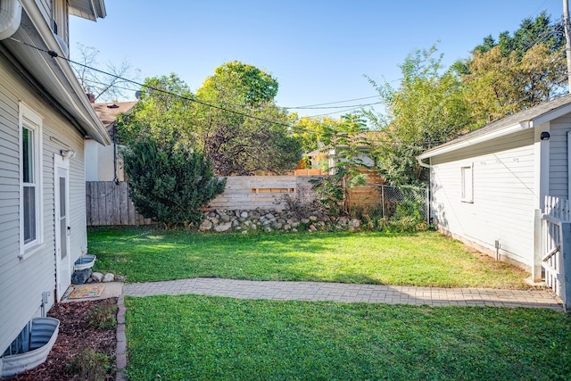 view of yard with a fenced backyard