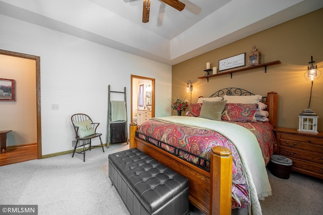 bedroom with ceiling fan and light carpet