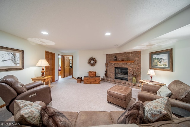 living room with a fireplace and light carpet