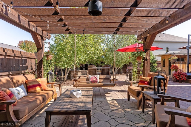 view of patio / terrace featuring an outdoor living space and a pergola