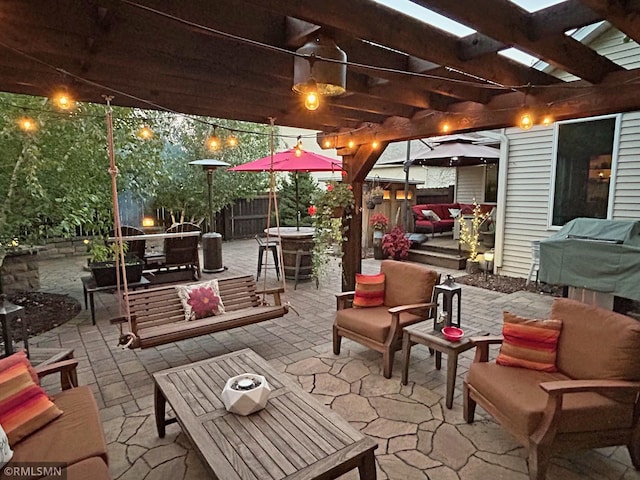 view of patio / terrace featuring an outdoor living space, a pergola, and a grill