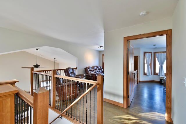 hall with dark hardwood / wood-style flooring