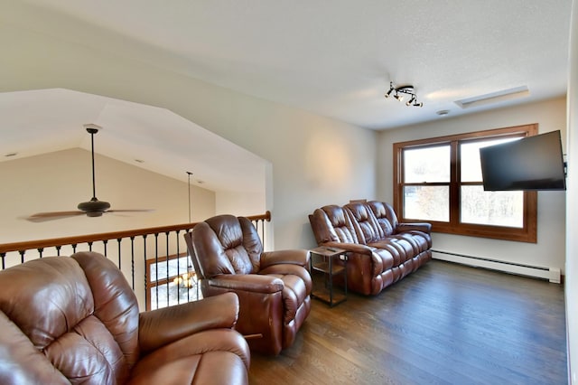 living room featuring lofted ceiling, baseboard heating, ceiling fan, and dark hardwood / wood-style floors