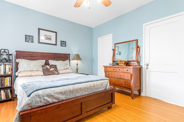 bedroom featuring ceiling fan and light hardwood / wood-style floors