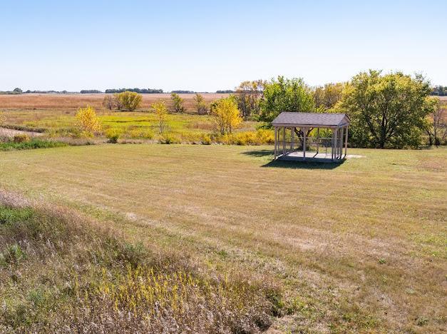 view of yard with a gazebo and a rural view