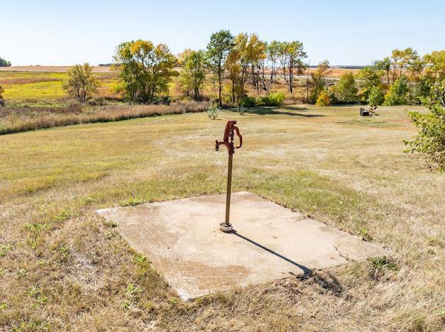 view of yard with a rural view