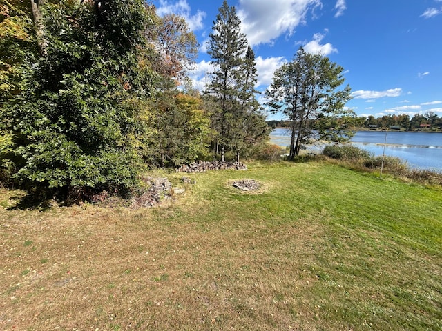 view of yard with a water view