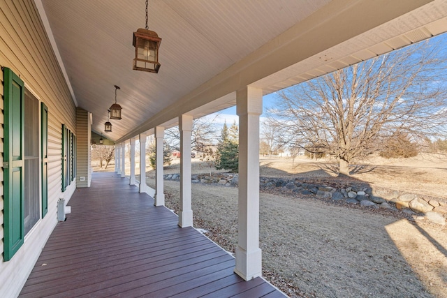 wooden deck featuring a porch