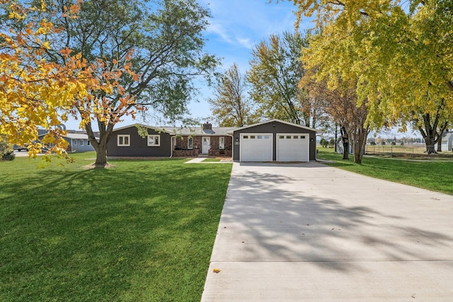 ranch-style home featuring a front yard and a garage