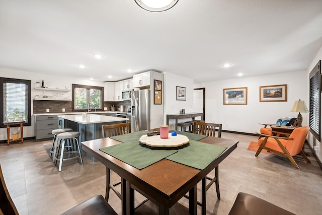 dining space with sink