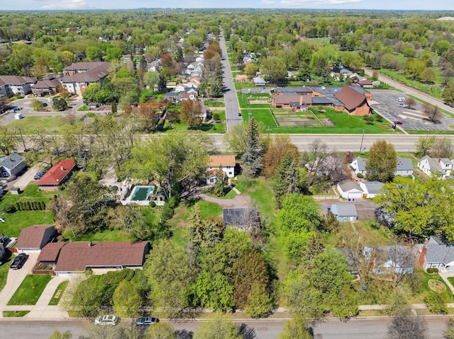 aerial view of property's location with nearby suburban area