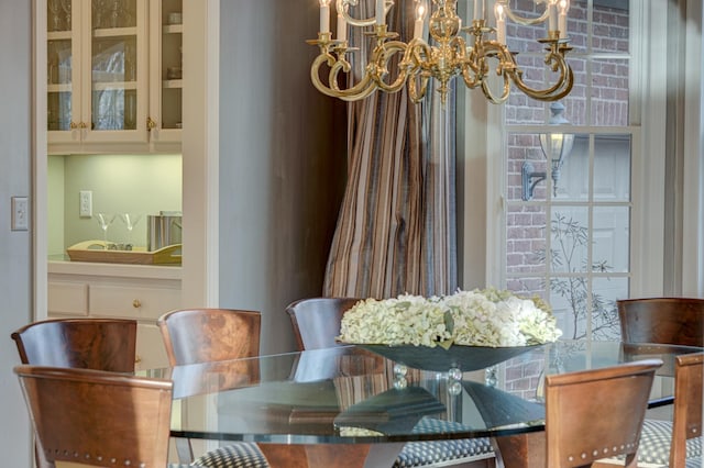 dining area with a notable chandelier