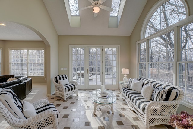 sunroom / solarium featuring ceiling fan