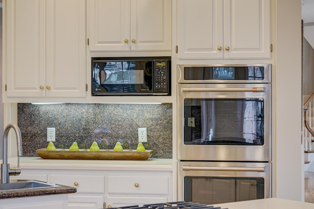 kitchen with white cabinetry