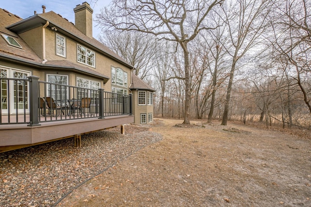 view of yard featuring a wooden deck