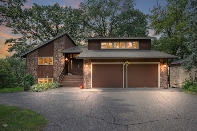 view of front of home with a garage