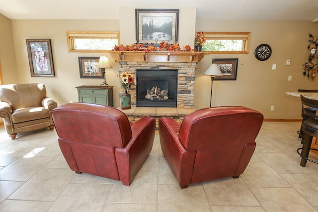 tiled living room with a fireplace