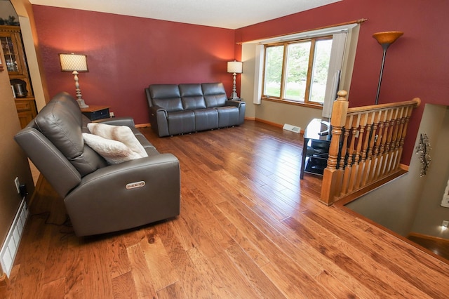 living room featuring wood-type flooring