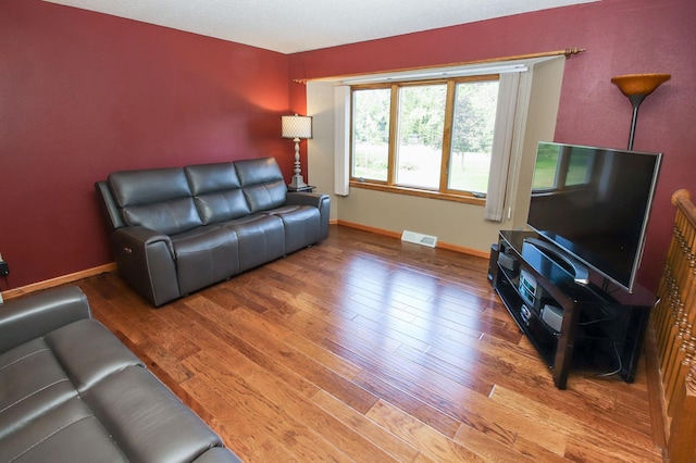 living room featuring hardwood / wood-style flooring