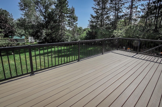 wooden deck with a yard