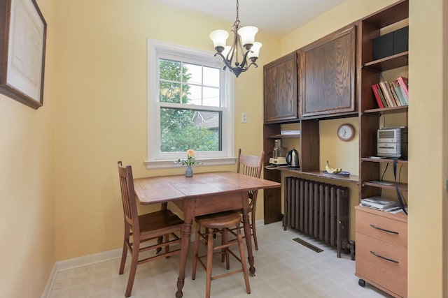 5025 16th Ave S, Minneapolis, MN 55417 - dining room featuring radiator, light floors, and a chandelier