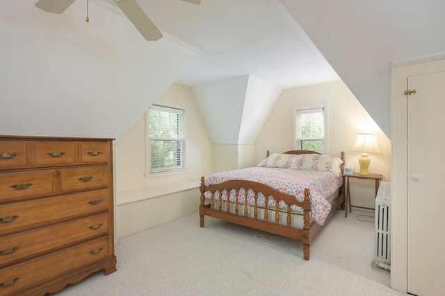 5025 16th Ave S, Minneapolis, MN 55417 - bedroom with radiator heating unit, light carpet, lofted ceiling, and a ceiling fan