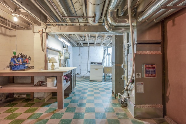 5025 16th Ave S, Minneapolis, MN 55417 - unfinished below grade area with washer / clothes dryer and tile patterned floors