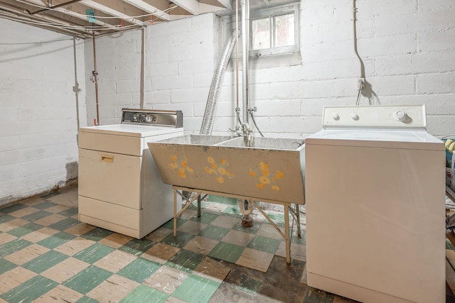 5025 16th Ave S, Minneapolis, MN 55417 - laundry area with tile patterned floors and washer and dryer