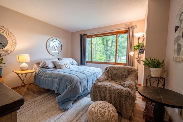 bedroom featuring hardwood / wood-style flooring