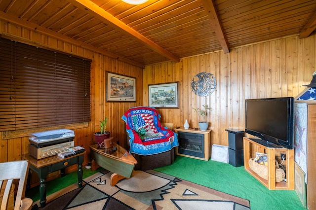 living room with wood ceiling, wooden walls, beam ceiling, and carpet flooring