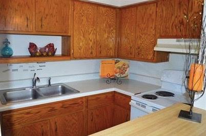 kitchen featuring sink and white electric stove