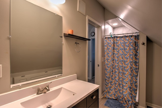 bathroom with tile patterned floors, vanity, lofted ceiling, and a shower with shower curtain