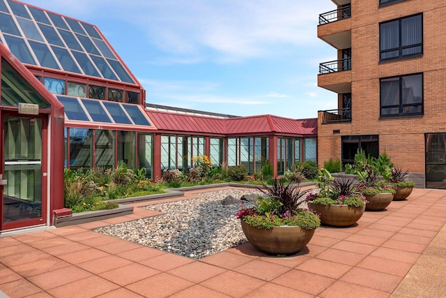 view of patio with a balcony