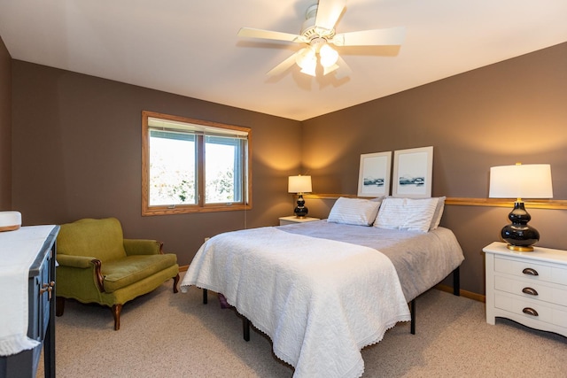 bedroom with light carpet and ceiling fan