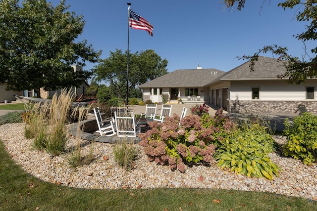 view of yard featuring a fire pit and a patio area