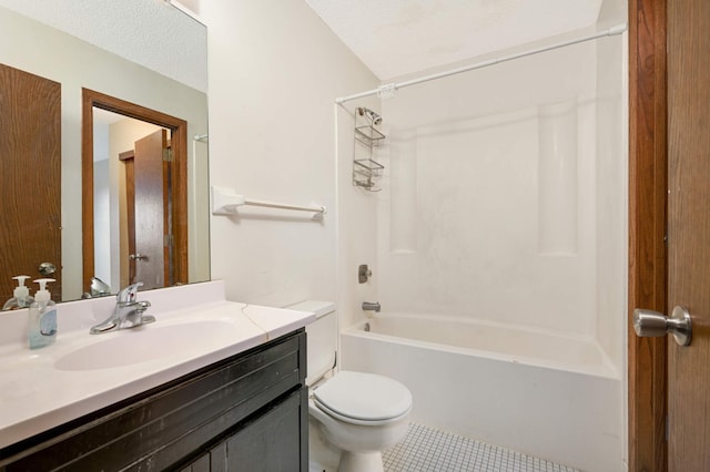 full bathroom with vanity, toilet, a textured ceiling, shower / bathing tub combination, and tile patterned flooring