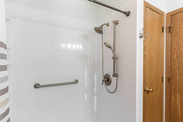 bathroom featuring a shower with curtain