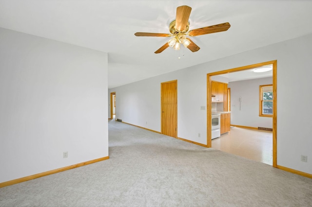 carpeted empty room with ceiling fan