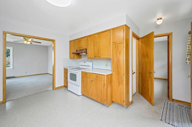 kitchen with electric stove, backsplash, and ceiling fan