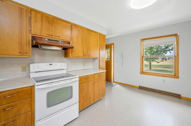 kitchen featuring white electric range, backsplash, and a baseboard heating unit