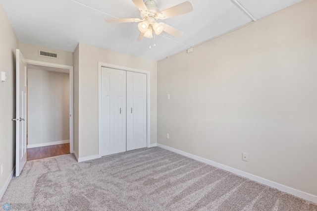 1110 3rd Ave N Unit 801W, Fargo, ND 58102 - unfurnished bedroom featuring baseboards, visible vents, a closet, and carpet flooring