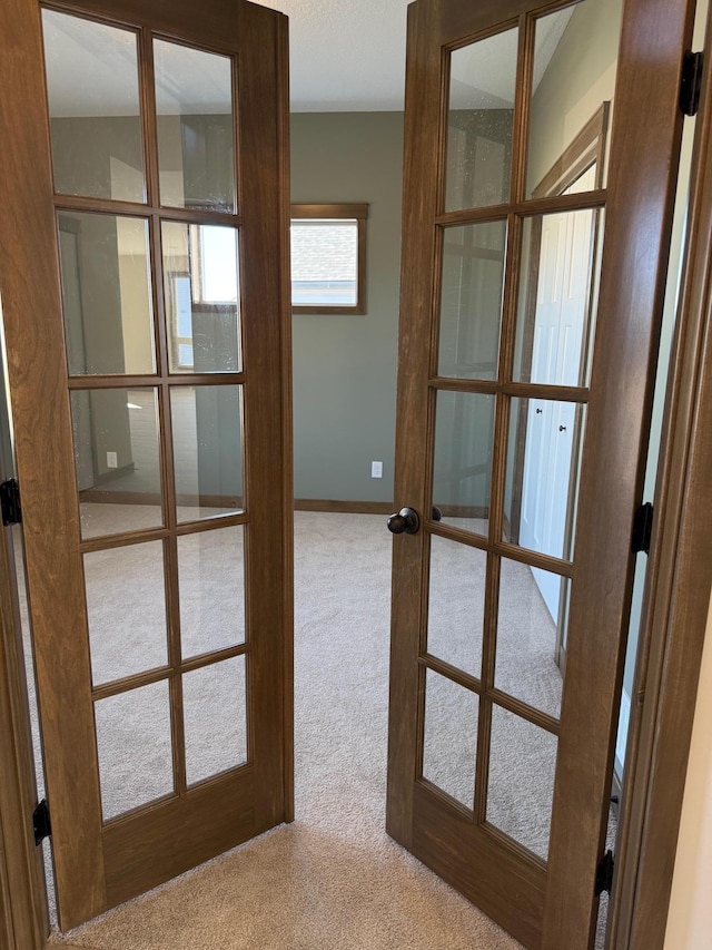 13077 Opal St NE, Blaine, MN 55449 - interior space featuring french doors and baseboards